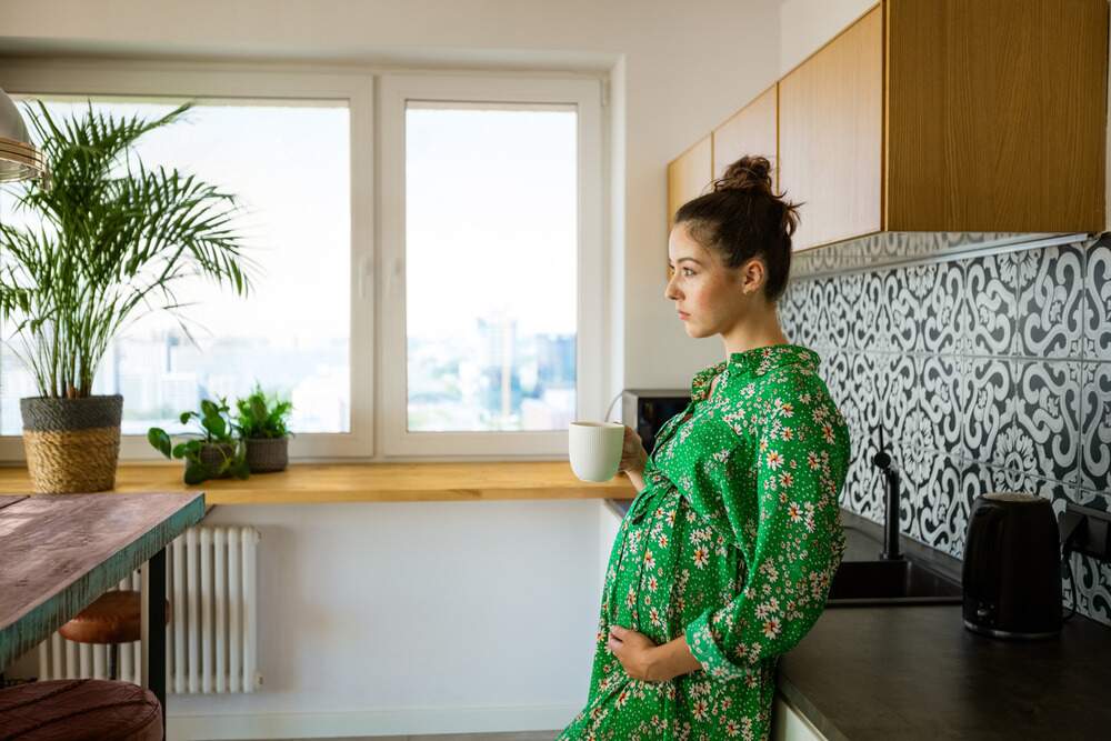 Pregnant women coffee - creative Love Surrogacy agency