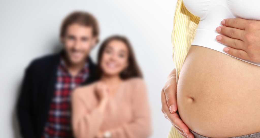 The intended parents with their surrogate
